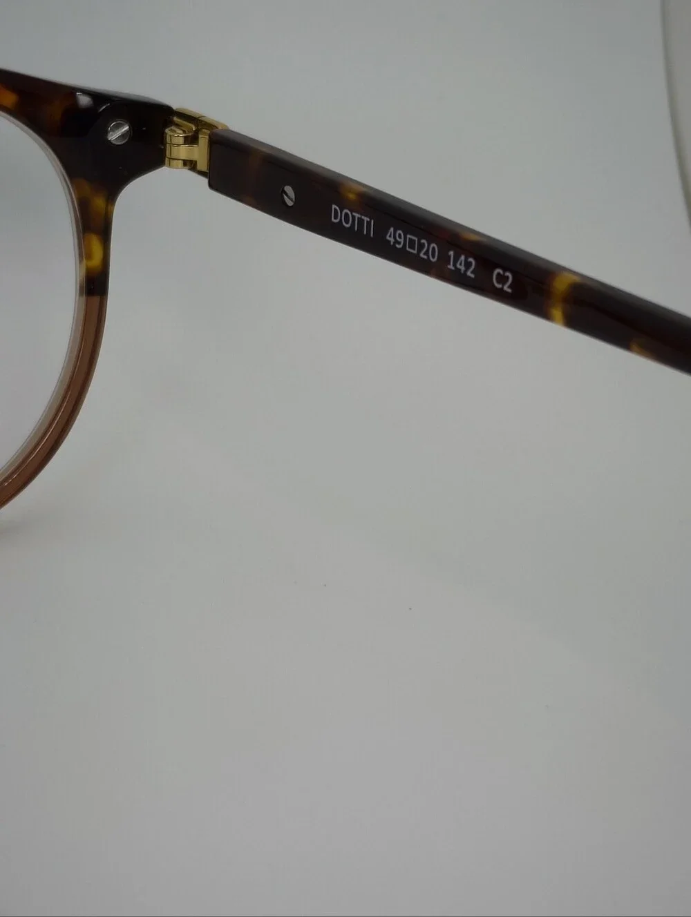 Dotti. Smoke Under Tortoiseshell Upper.  Eyeglasses - Brown Amber. Gold